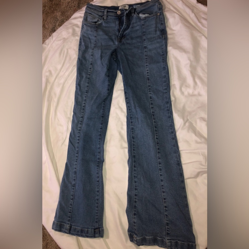 Open leg at the bottom blue jeans